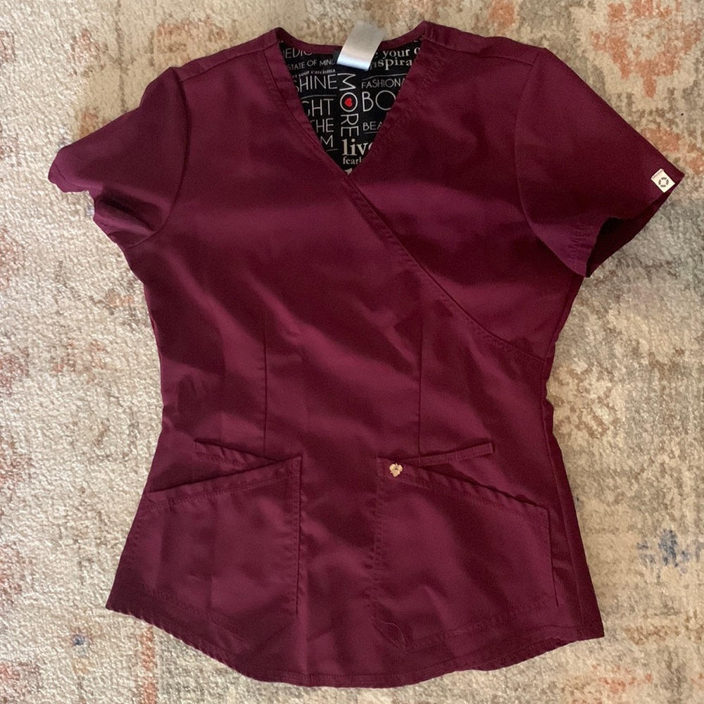 Careisma scrub top. Size small.